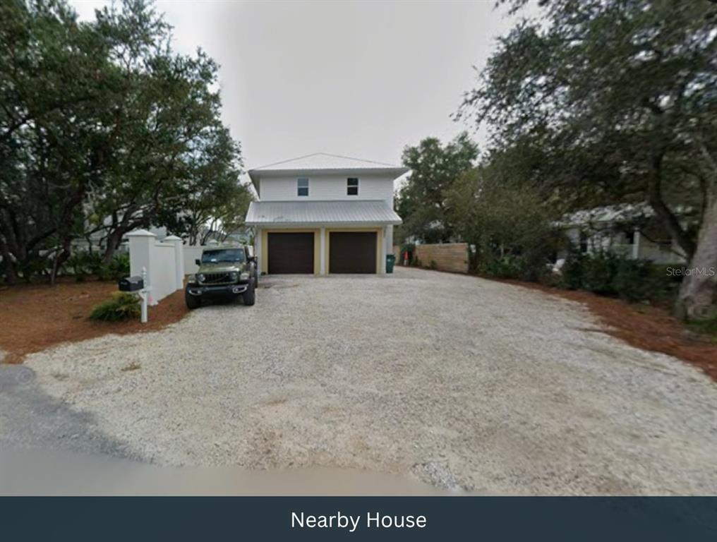 51 Cove Creek Lane Inlet Beach, FL 32461 - Photo 24 of 26 a view of house with outdoor space