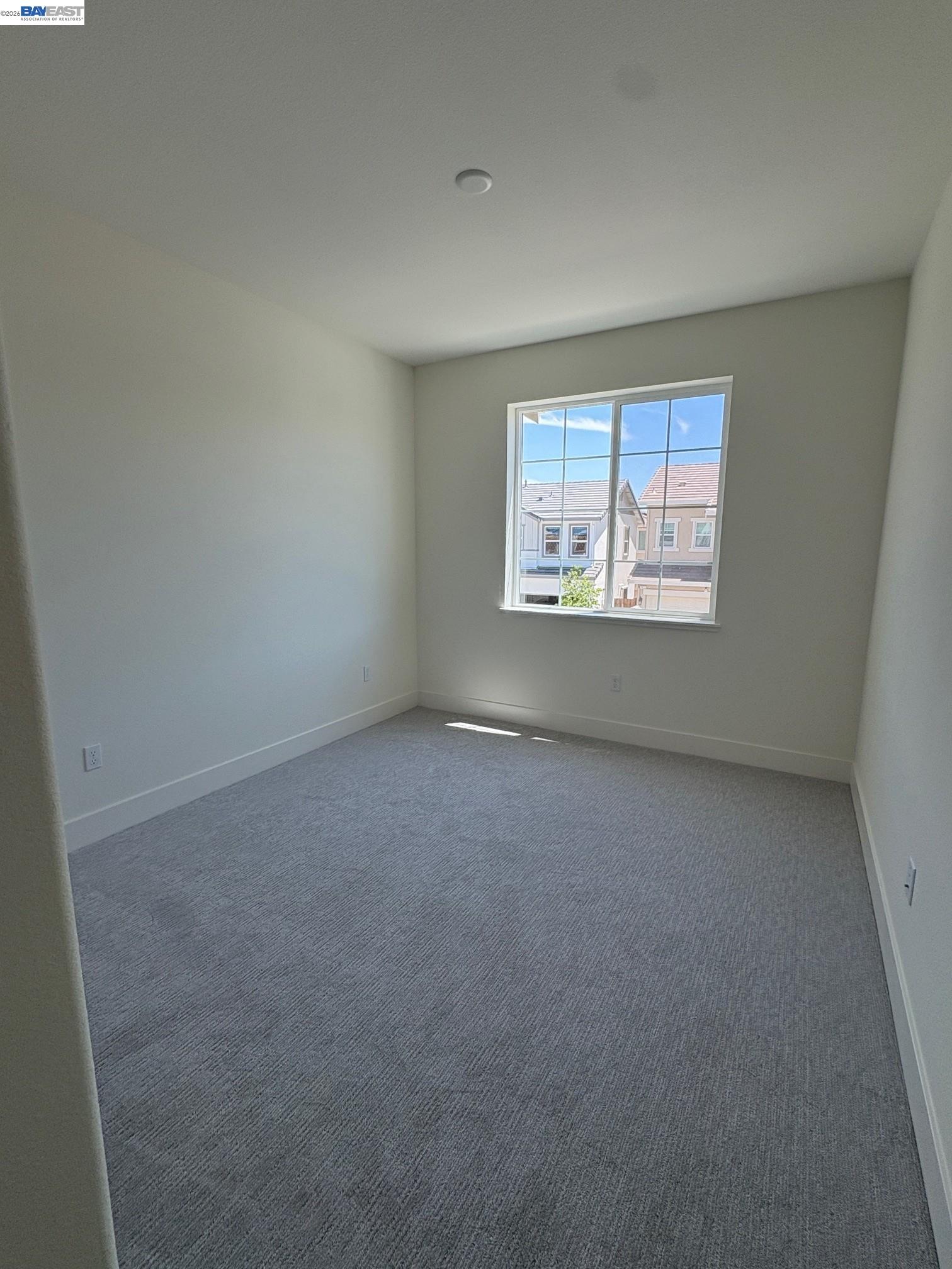 1476 Monument Lane Fairfield, CA 94533 - Photo 14 of 24 an empty room with windows