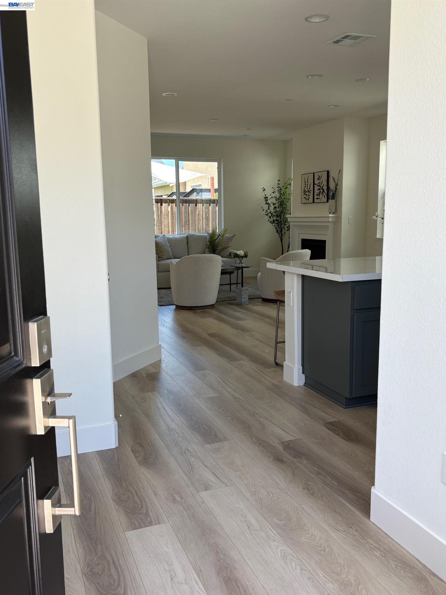 1476 Monument Lane Fairfield, CA 94533 - Photo 2 of 24 a living room with furniture and a wooden floor
