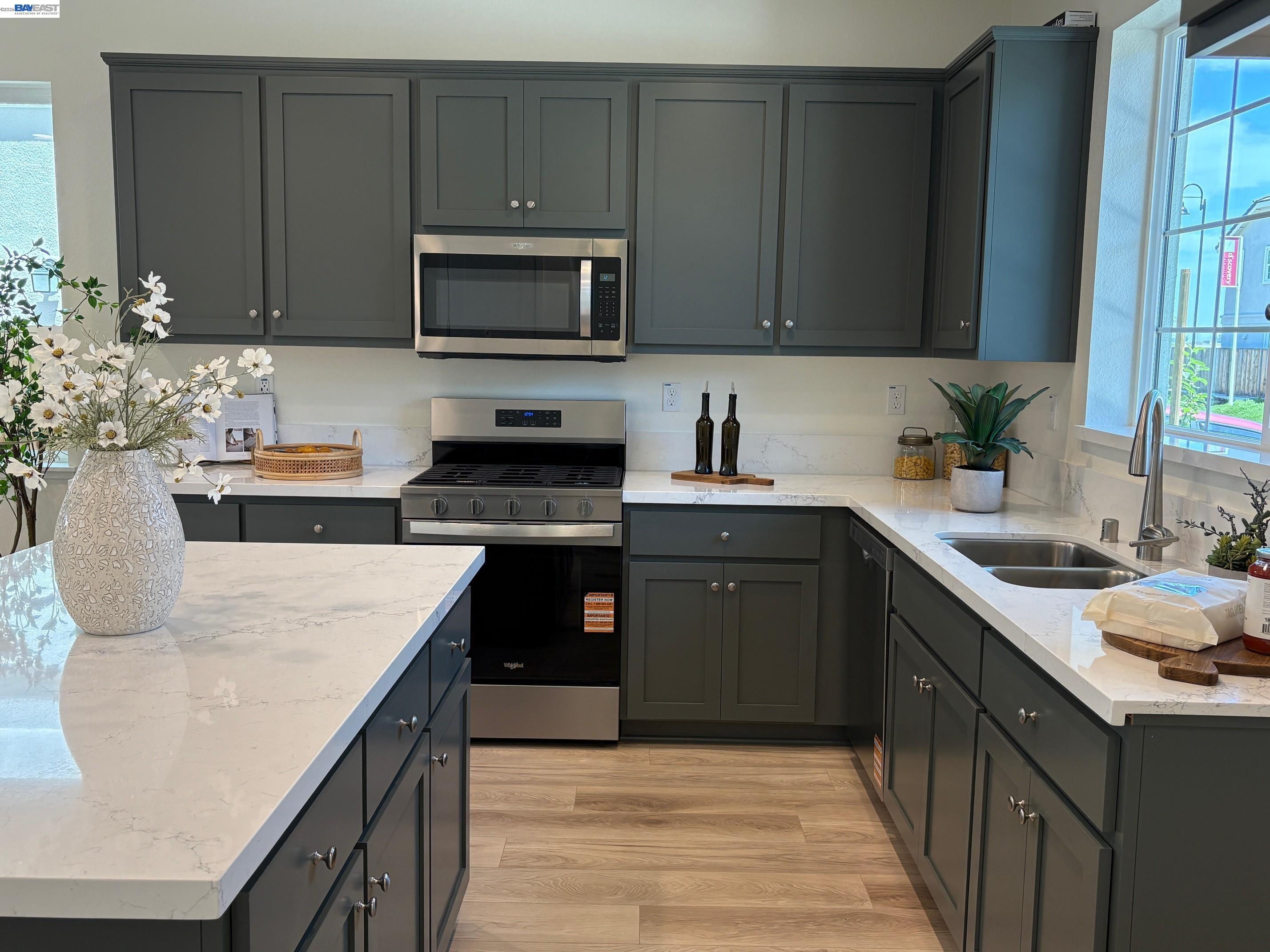 1476 Monument Lane Fairfield, CA 94533 - Photo 3 of 24 a kitchen with a sink and cabinets