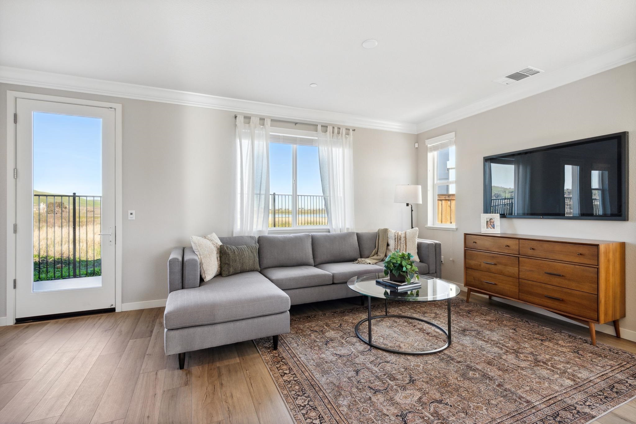 1476 Monument Lane Fairfield, CA 94533 - Photo 7 of 21 a living room with furniture and a flat screen tv