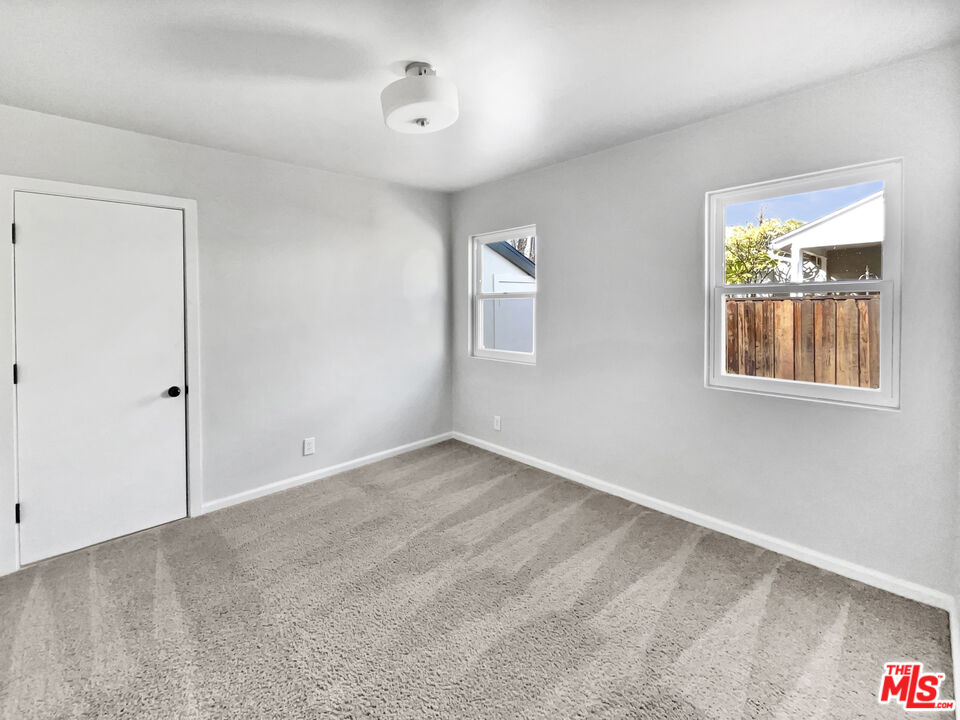 6906 Balcom Avenue Reseda, CA 91335 - Photo 15 of 19 an empty room with windows
