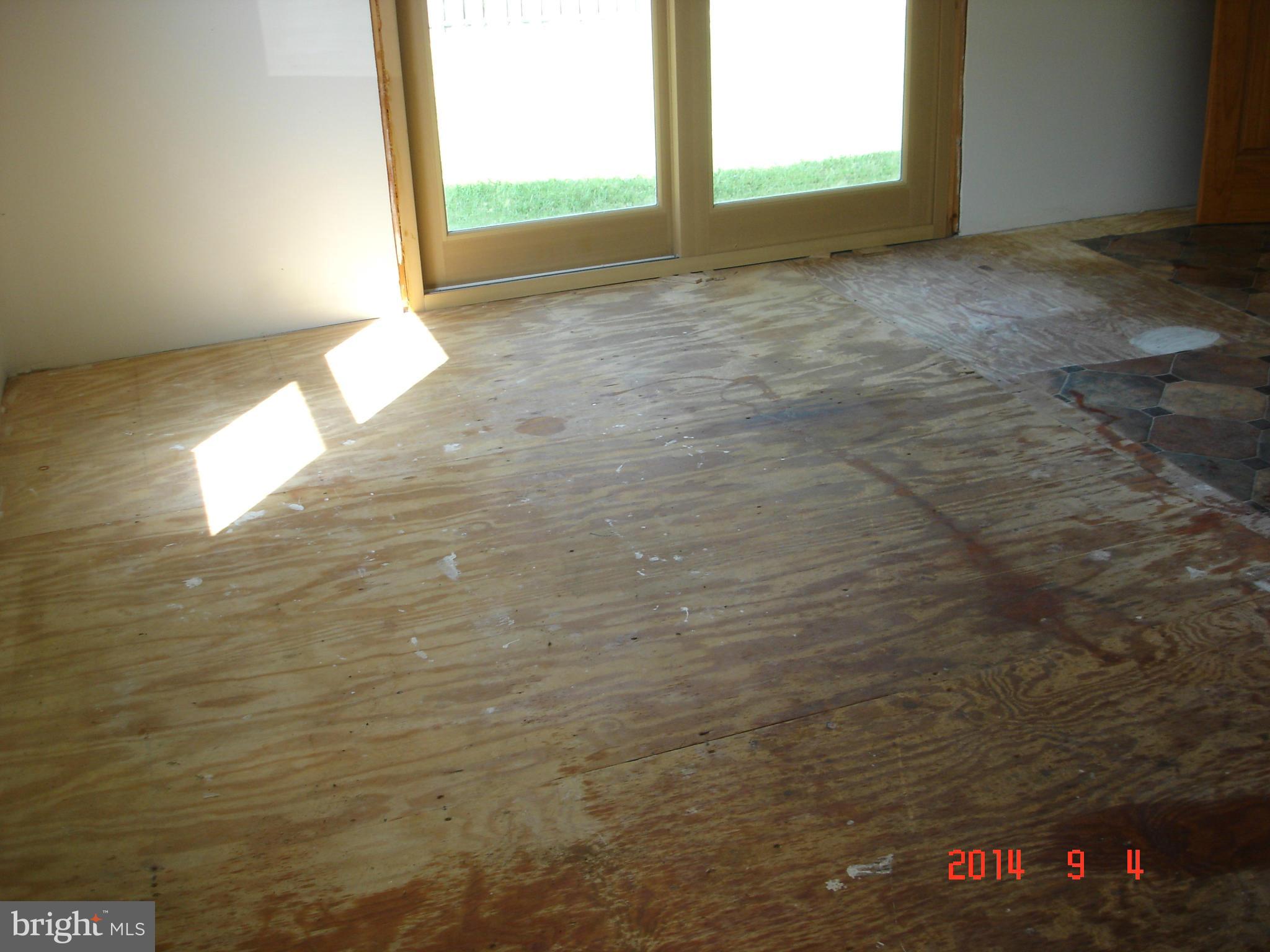 1828 Marshall Road Dundalk, MD 21222 - Photo 3 of 5 a view of an empty room and window