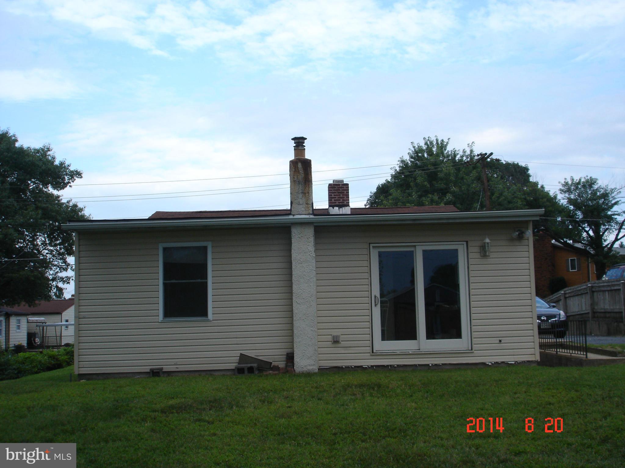 1828 Marshall Road Dundalk, MD 21222 - Photo 4 of 5 a view of a house with a yard