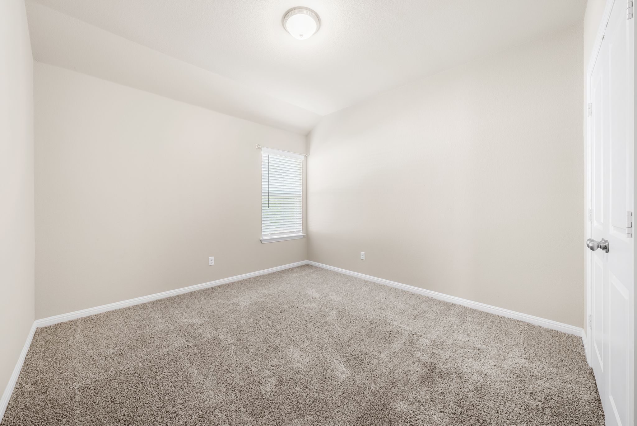300 Prato Place Georgetown, TX 78628 - Photo 25 of 40 A well-lit room offers fresh carpet and a clean palette for personalized design.