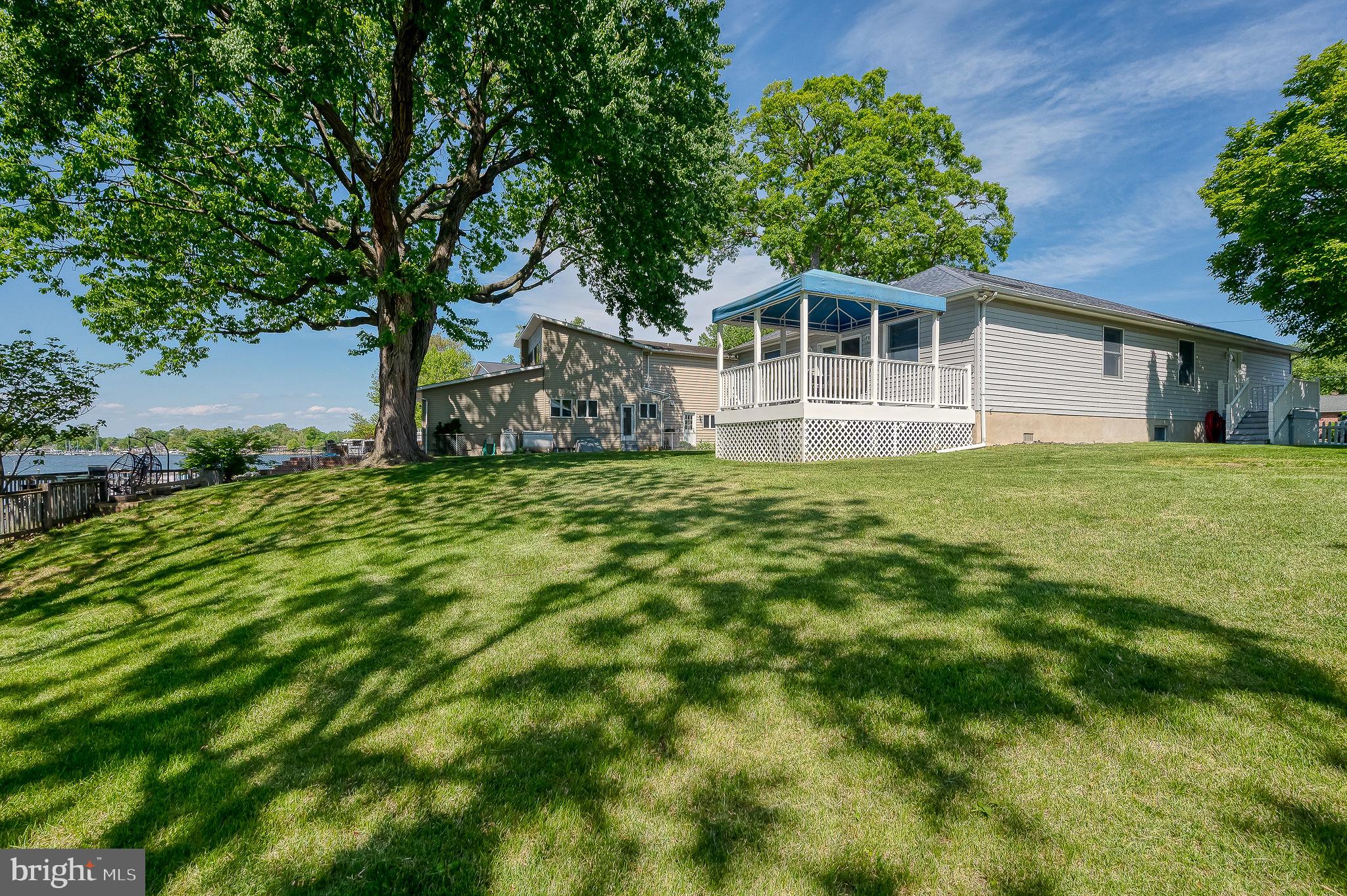 2222 Monocacy Road Essex, MD 21221 - Photo 48 of 70 Charming lakeside retreat with lush lawn.