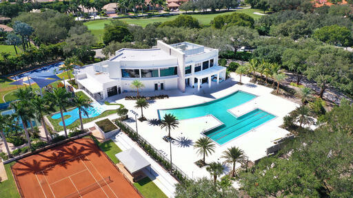 7370 Orangewood Lane, Unit 302 Boca Raton, FL 33433 - Photo 37 of 38 Aerial of The Curve and Red Clay Court