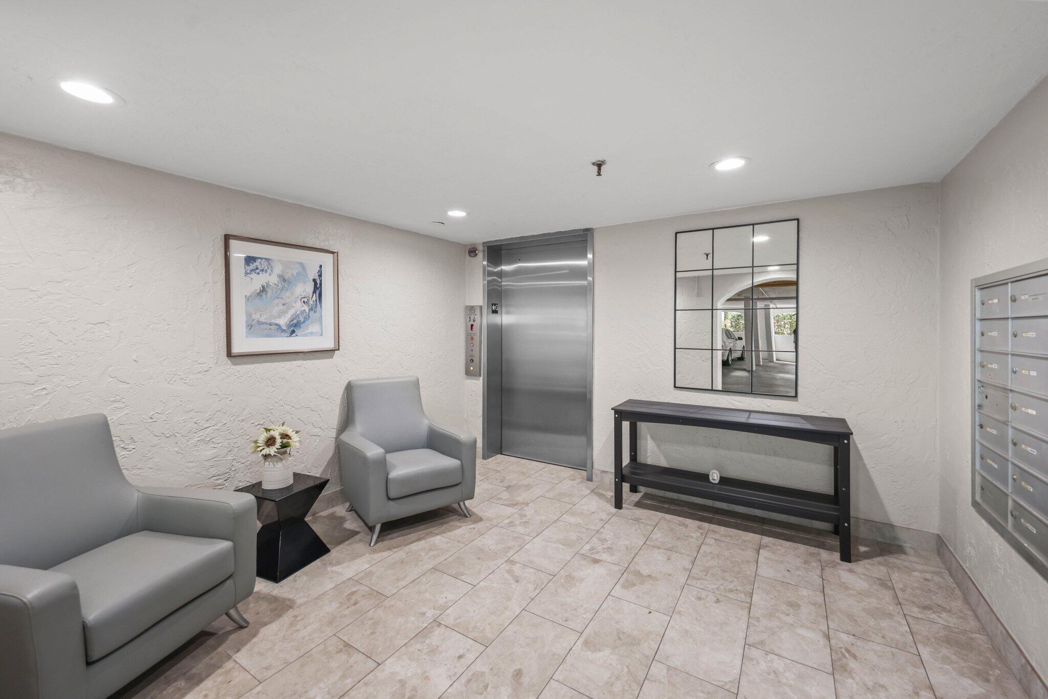 7370 Orangewood Lane, Unit 302 Boca Raton, FL 33433 - Photo 5 of 38 Elevator in Lobby