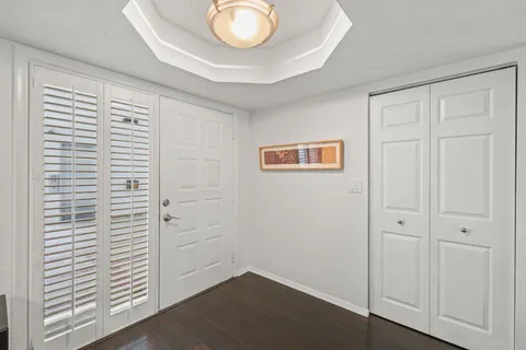 a view of a livingroom with wooden floor