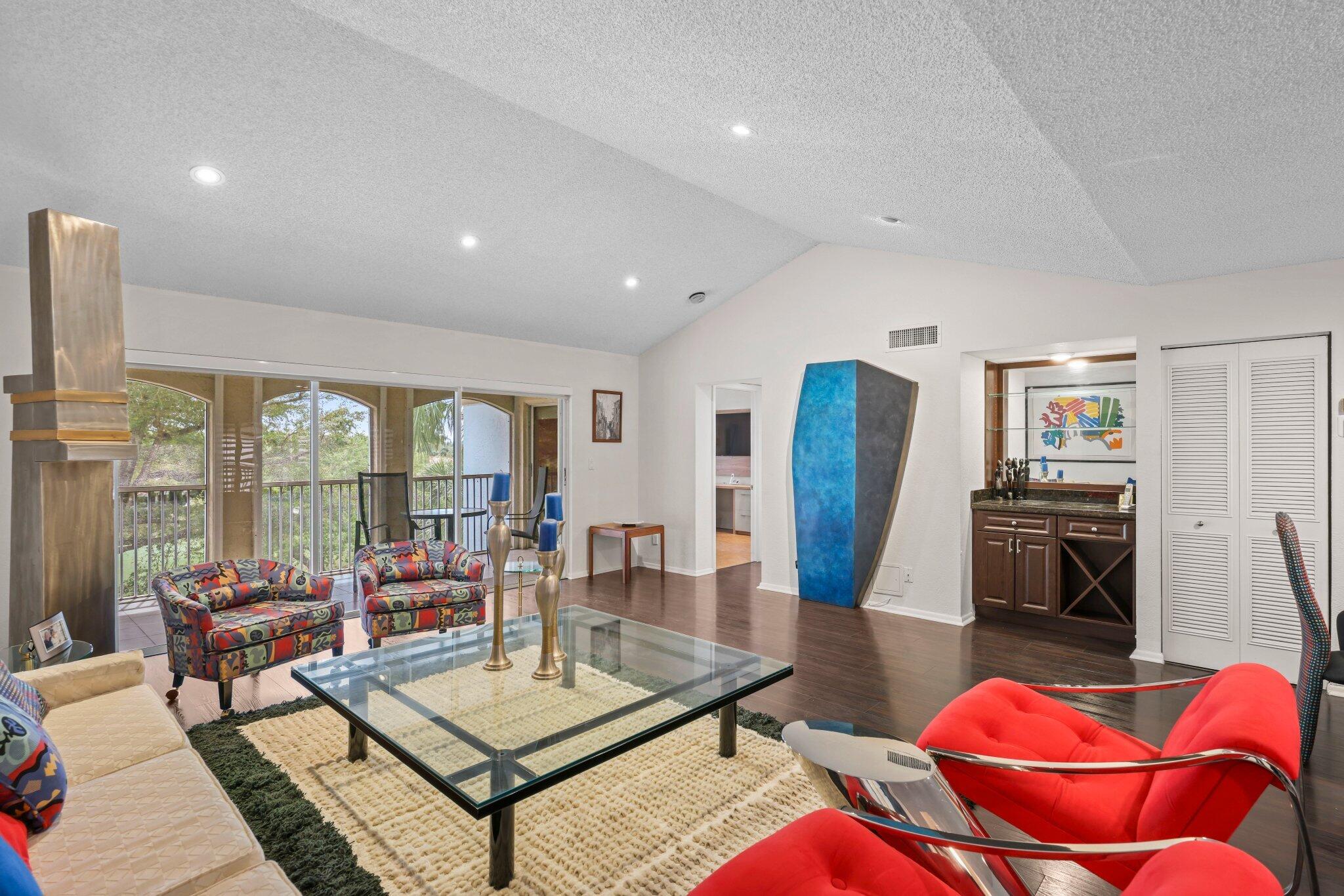 7370 Orangewood Lane, Unit 302 Boca Raton, FL 33433 - Photo 10 of 38 Living Room and Balcony