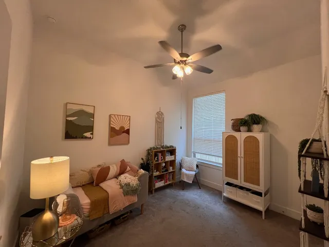 a kitchen with stainless steel appliances granite countertop a refrigerator a sink and a stove