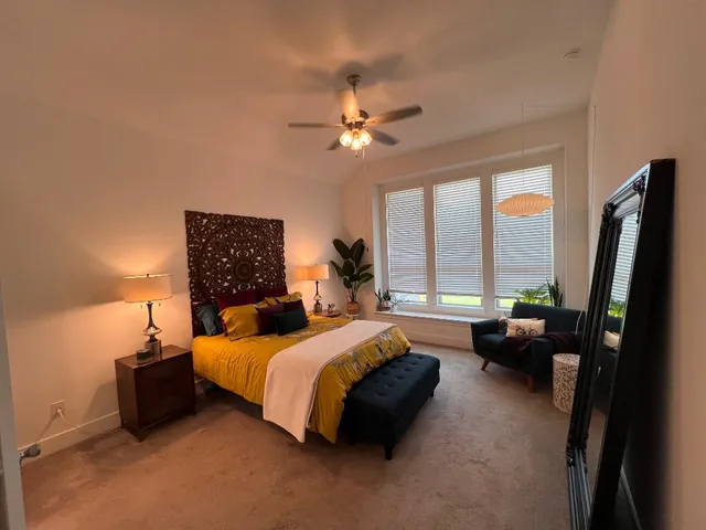 a kitchen with stainless steel appliances a stove a microwave and a sink