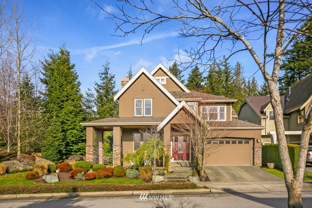 2989 Northeast Davis Loop Issaquah, WA 98029 - Photo 2 of 37 a front view of a house with a yard