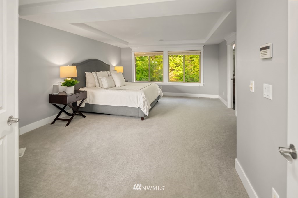 2989 Northeast Davis Loop Issaquah, WA 98029 - Photo 23 of 37 a bedroom with a bed and a window