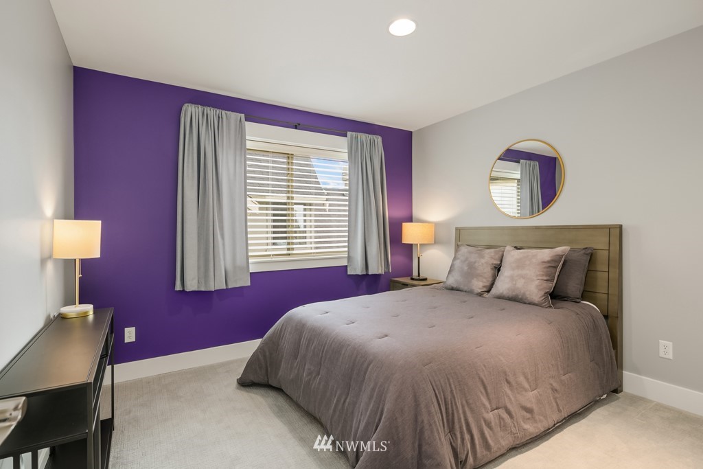 2989 Northeast Davis Loop Issaquah, WA 98029 - Photo 30 of 37 a bedroom with a bed and wooden floor