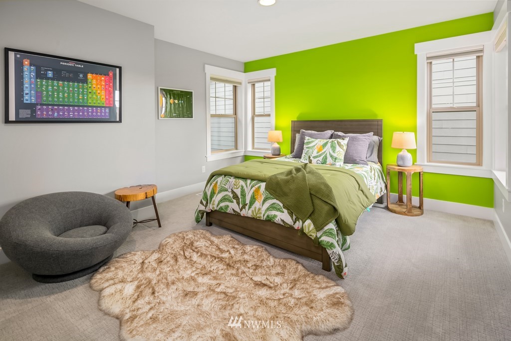 2989 Northeast Davis Loop Issaquah, WA 98029 - Photo 31 of 37 a bedroom with a bed and a couch