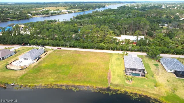 an aerial view of a house with a swimming pool