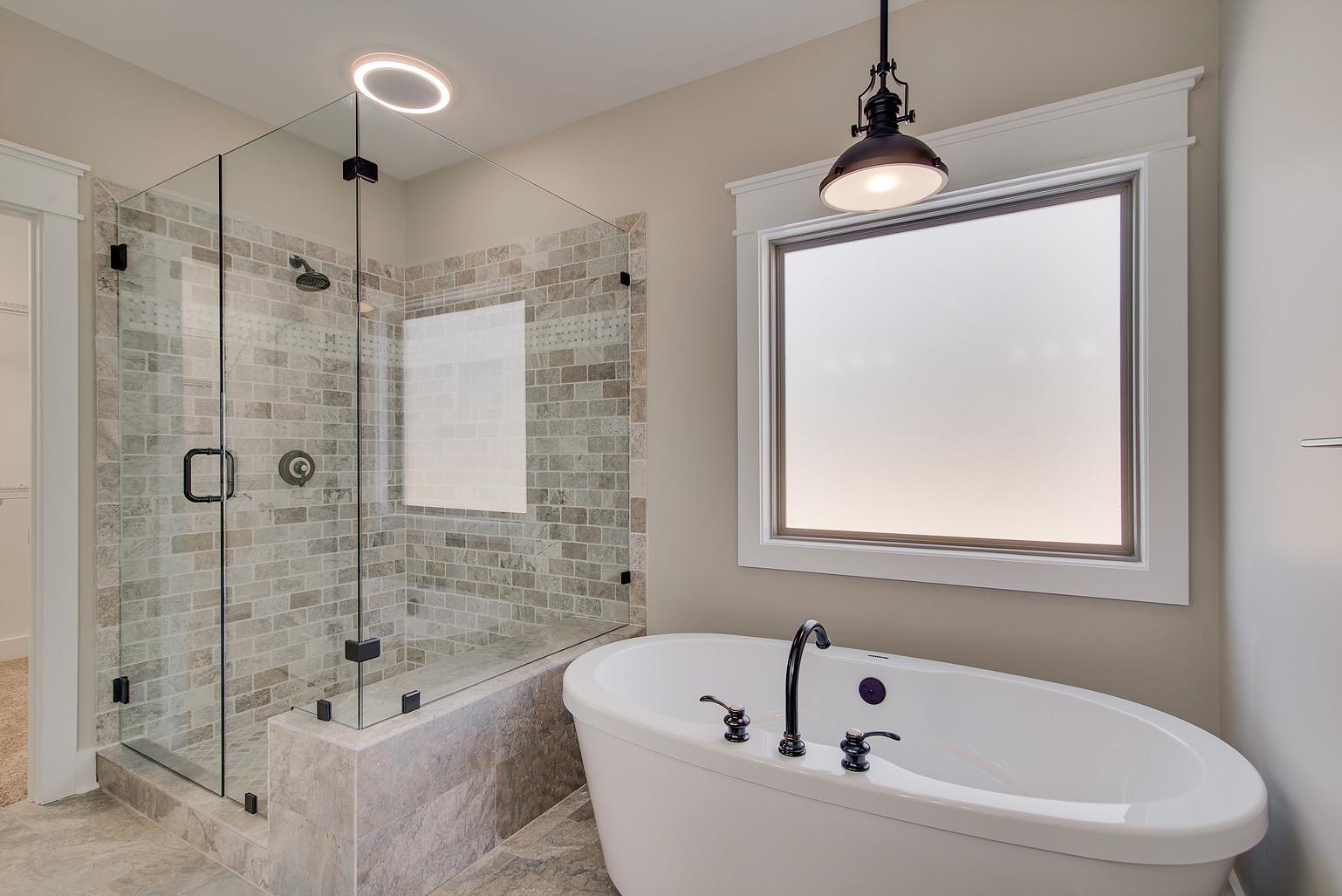 1341 Camp Ravine Road Burns, TN 37029 - Photo 6 of 9 a white bath tub sitting next to a shower
