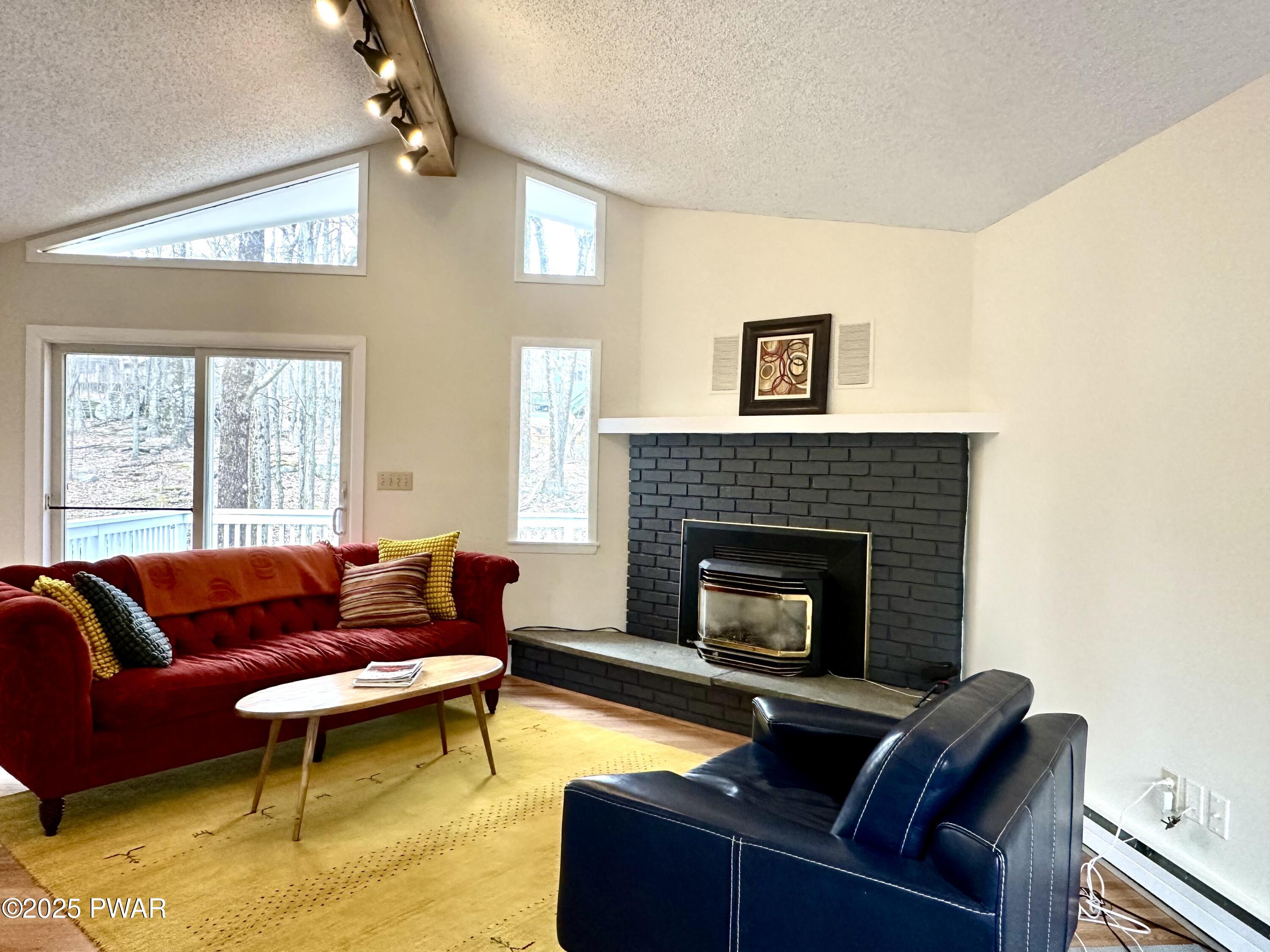 107 Ridgeway Drive Hawley, PA 18428 - Photo 4 of 27 Warm up by the Fireplace in the Winter