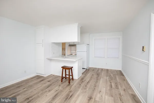 a workspace with wooden floor