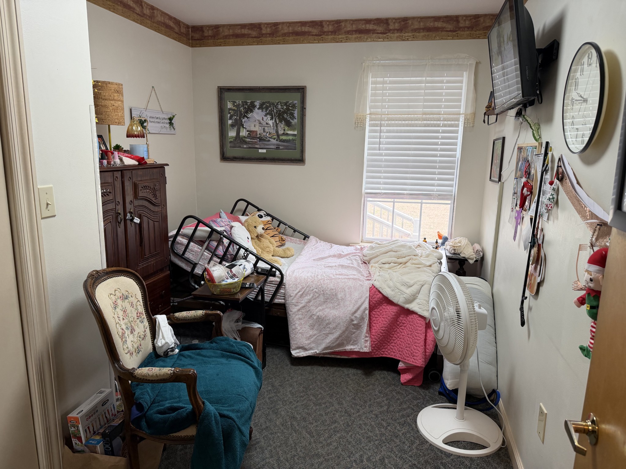 521 Pike Hill Road McMinnville, TN 37110 - Photo 12 of 15 a bedroom with a bed and a chair in it
