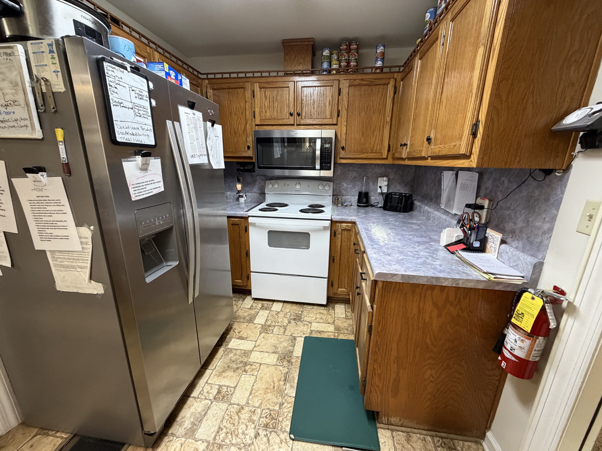 521 Pike Hill Road McMinnville, TN 37110 - Photo 7 of 15 a kitchen with stainless steel appliances granite countertop a refrigerator a stove a sink and dishwasher