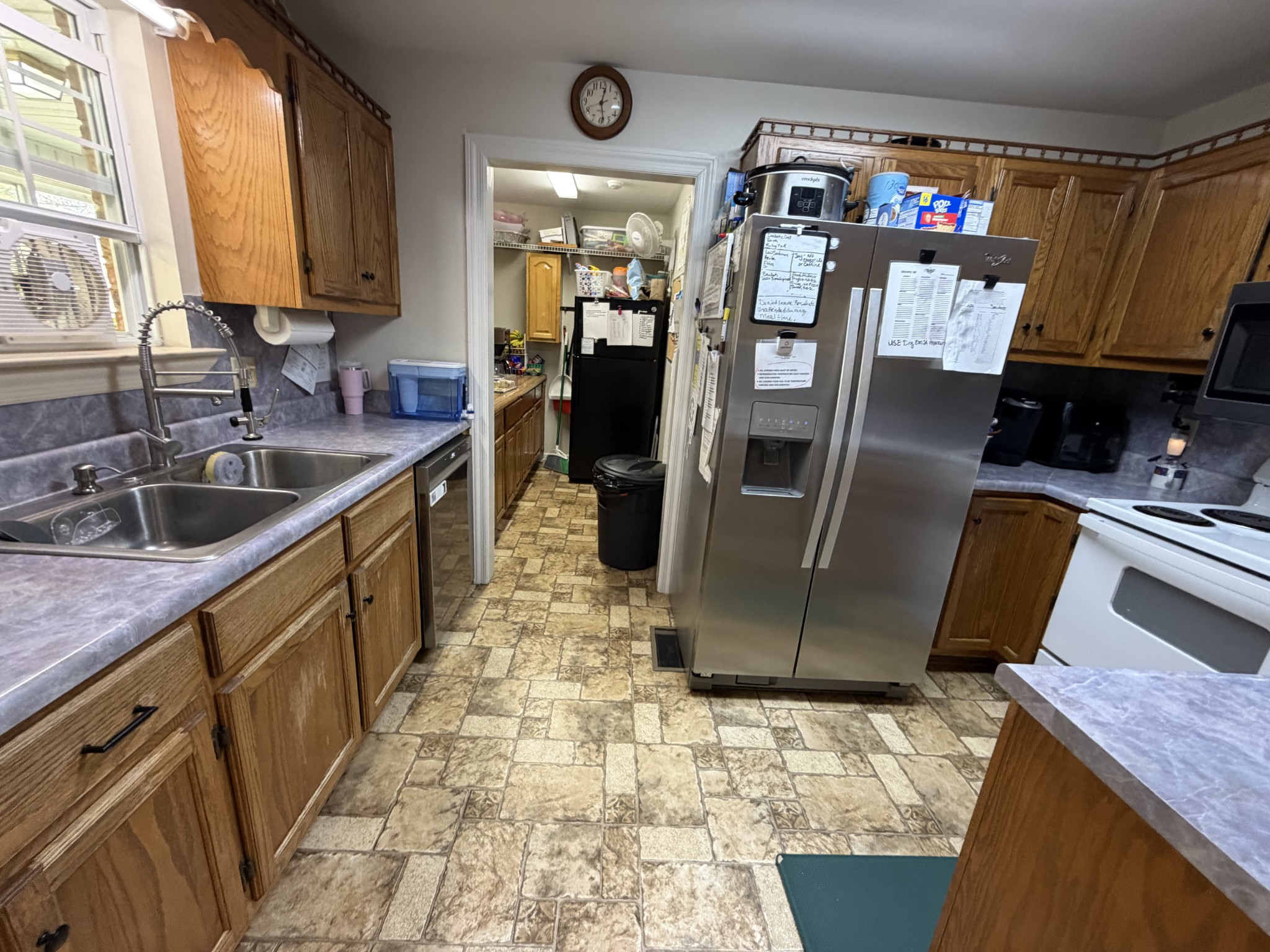 521 Pike Hill Road McMinnville, TN 37110 - Photo 9 of 15 a kitchen with refrigerator and sink