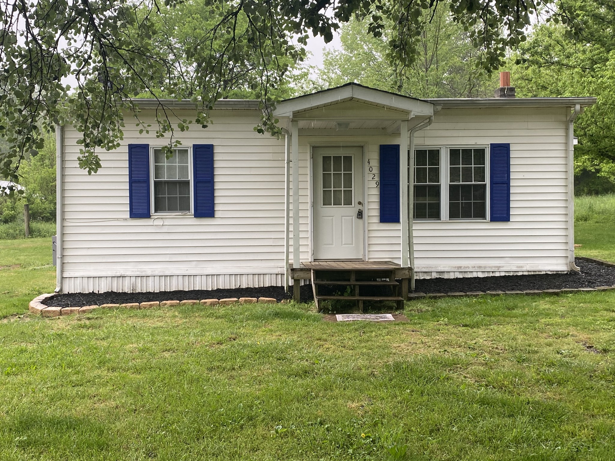 4029 Prospect Elkton Road Prospect, TN 38477 - Photo 15 of 21 a front view of a house with a yard