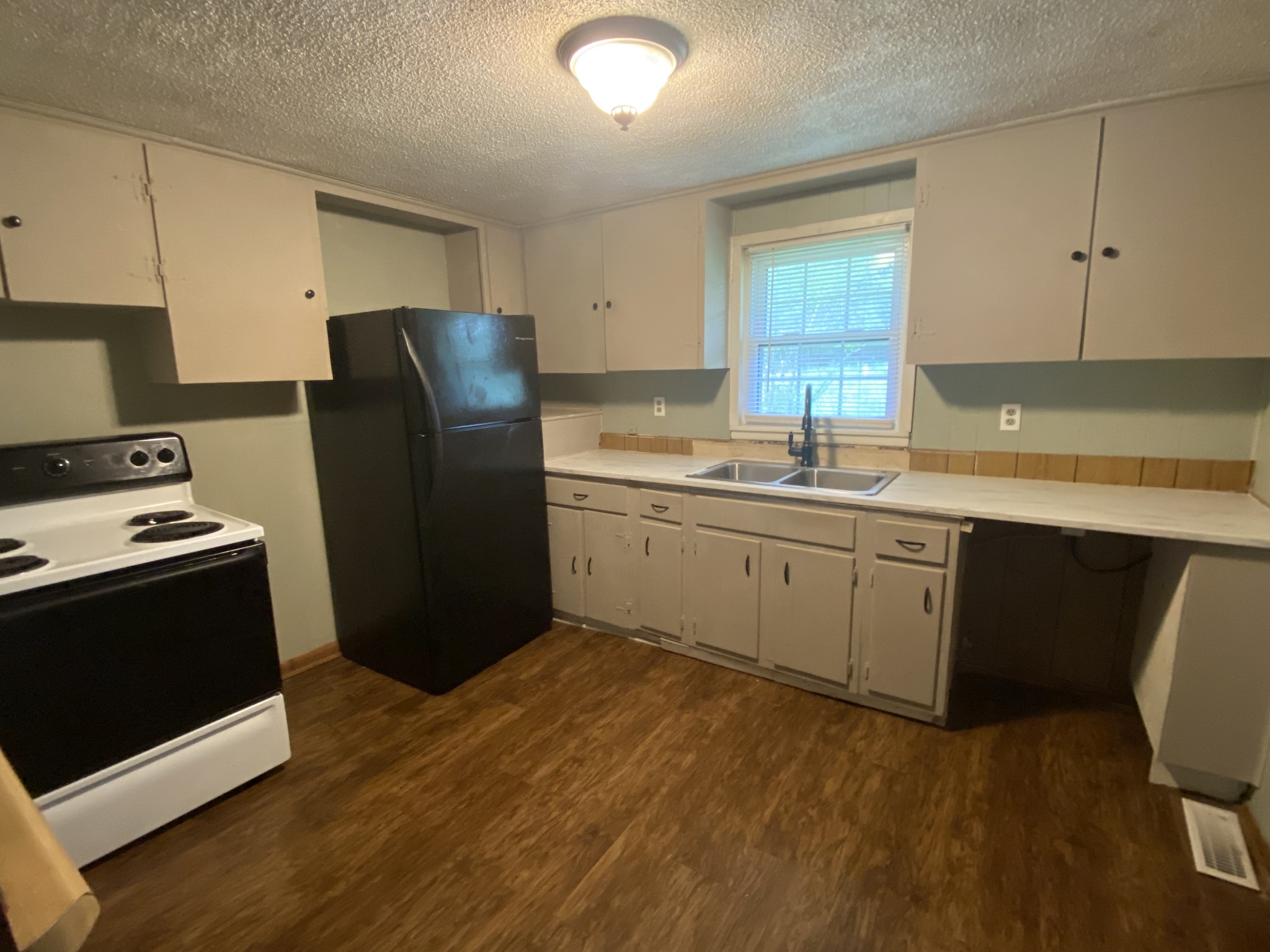 4029 Prospect Elkton Road Prospect, TN 38477 - Photo 6 of 21 a kitchen with a refrigerator sink and stove