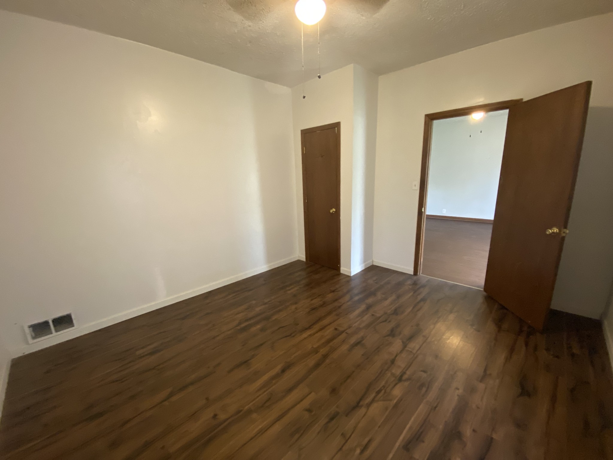 4029 Prospect Elkton Road Prospect, TN 38477 - Photo 10 of 21 an empty room with wooden floor and windows
