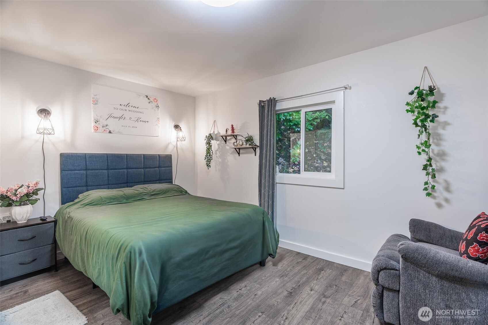 16405 Maple Valley Highway, Unit 22 Renton, WA 98058 - Photo 20 of 31 a bedroom with a bed table chair and a window