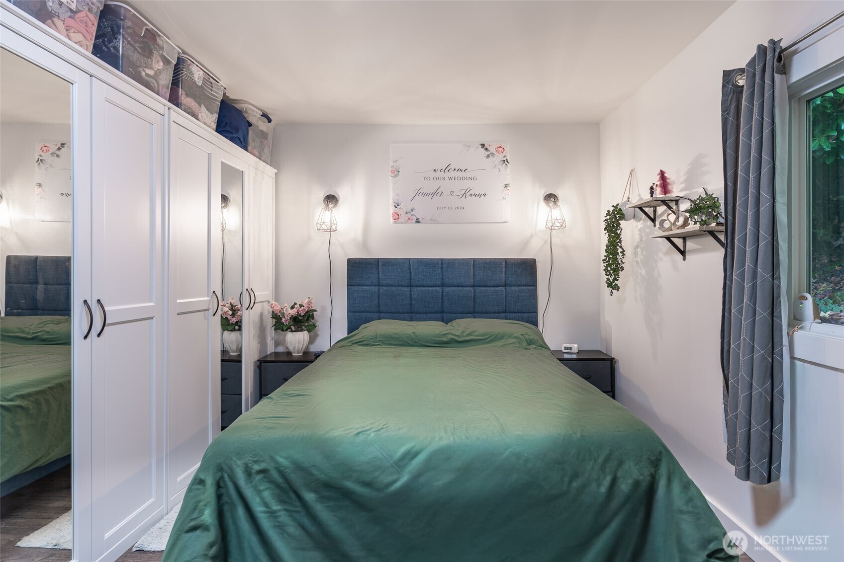 16405 Maple Valley Highway, Unit 22 Renton, WA 98058 - Photo 21 of 31 a bed room with a bed and a large mirror