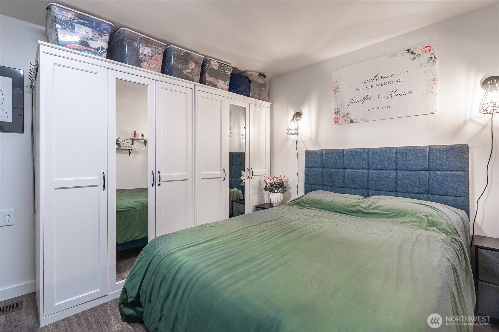 16405 Maple Valley Highway, Unit 22 Renton, WA 98058 - Photo 22 of 31 a bedroom with a bed and a refrigerator