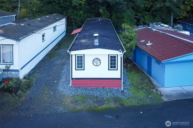 a aerial view of a house with a yard