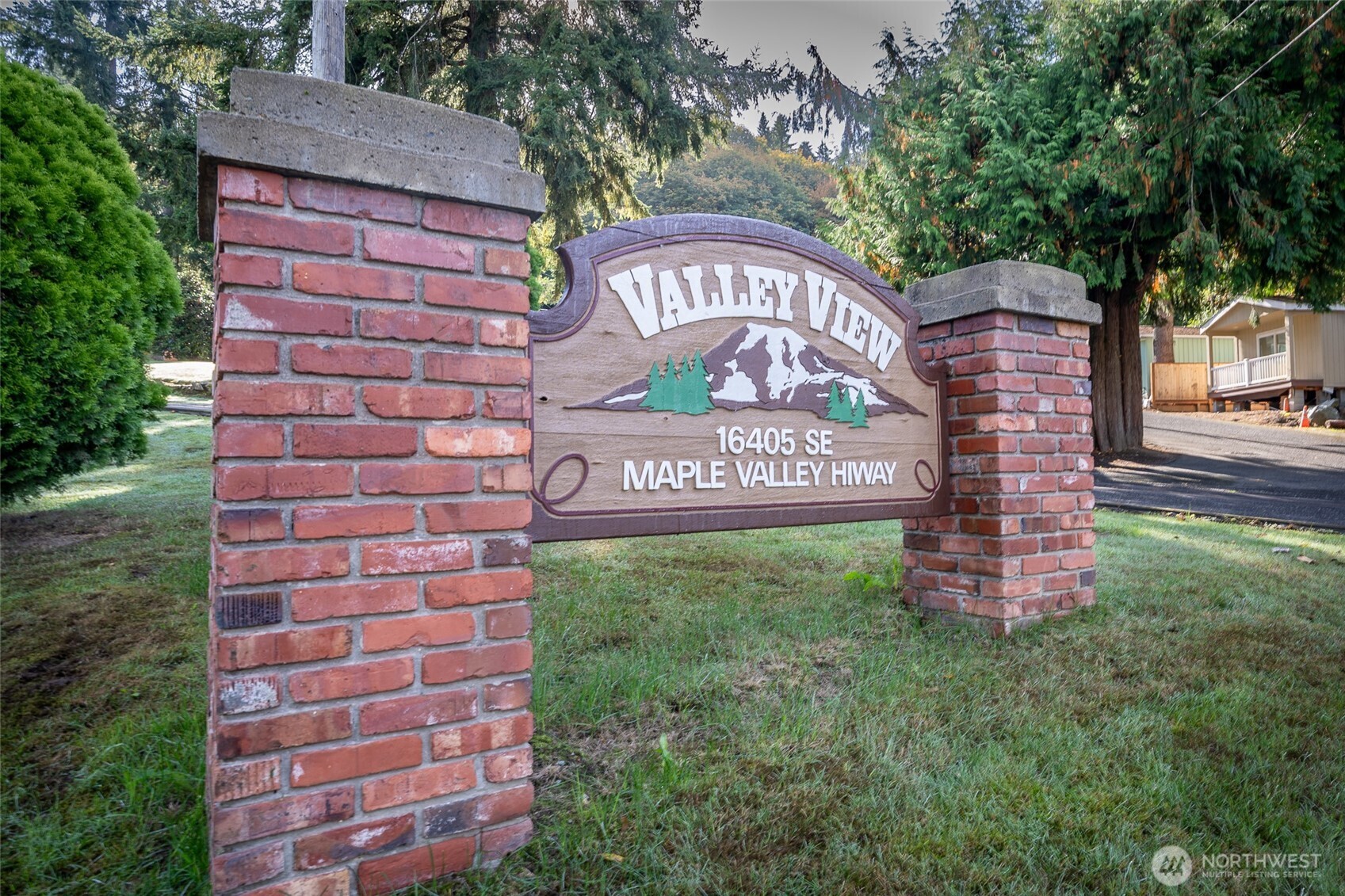 16405 Maple Valley Highway, Unit 22 Renton, WA 98058 - Photo 5 of 31 a sign on the side of a building