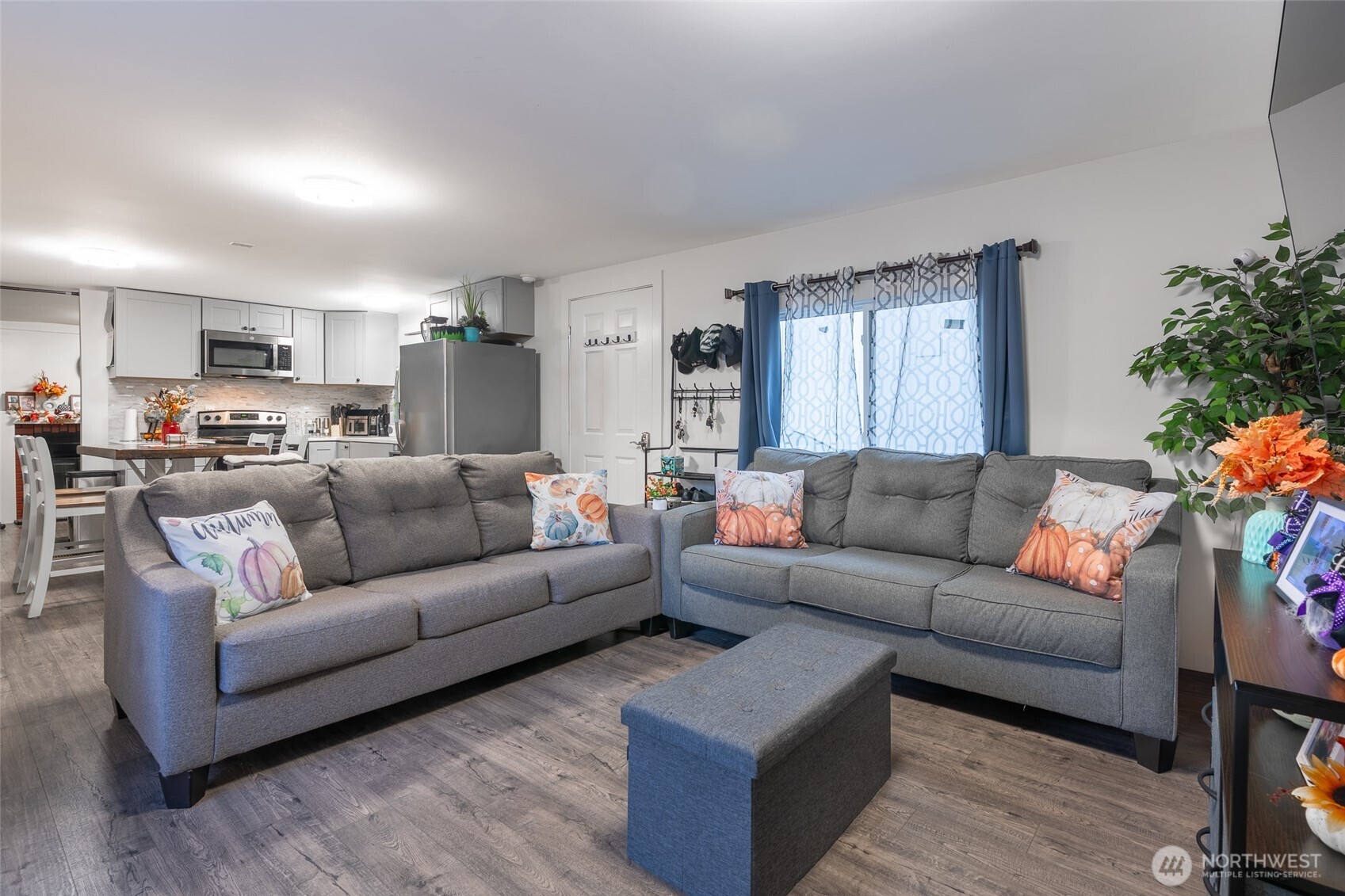 16405 Maple Valley Highway, Unit 22 Renton, WA 98058 - Photo 8 of 31 a living room with furniture and a large window