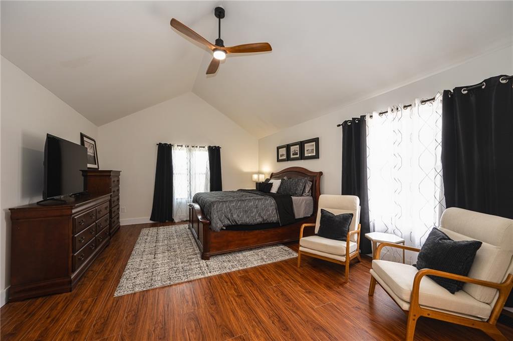 3339 Cove Overlook Road Gainesville, GA 30501 - Photo 17 of 67 a bedroom with a bed and furniture