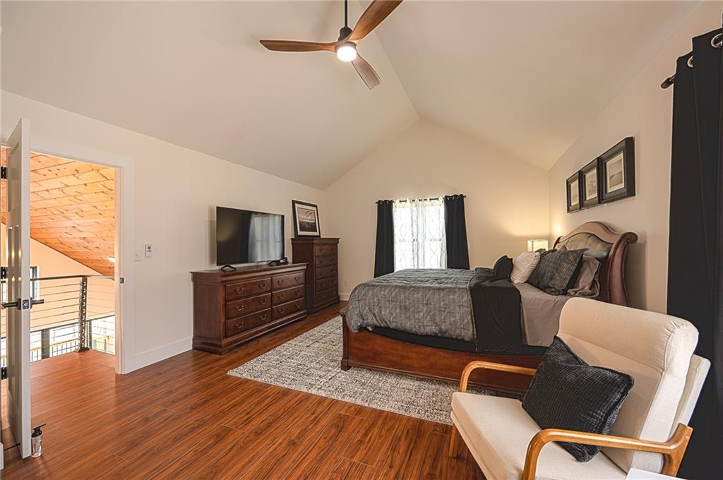 3339 Cove Overlook Road Gainesville, GA 30501 - Photo 18 of 67 a living room with furniture and a flat screen tv