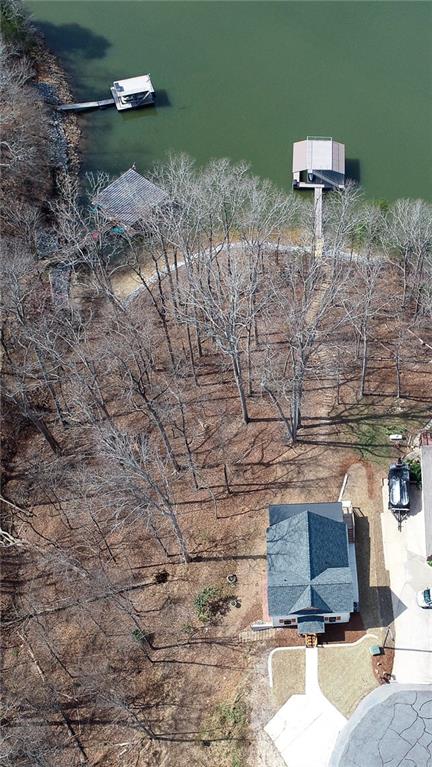 3339 Cove Overlook Road Gainesville, GA 30501 - Photo 2 of 67 a backyard of a house with a yard