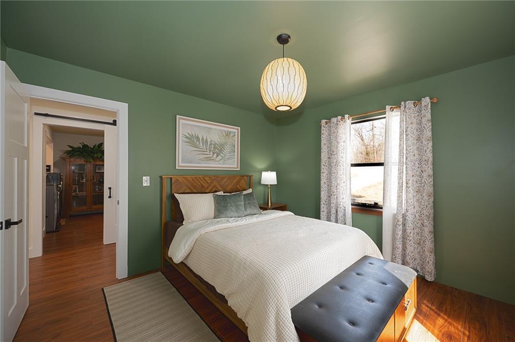 3339 Cove Overlook Road Gainesville, GA 30501 - Photo 25 of 67 a bedroom with bed and window