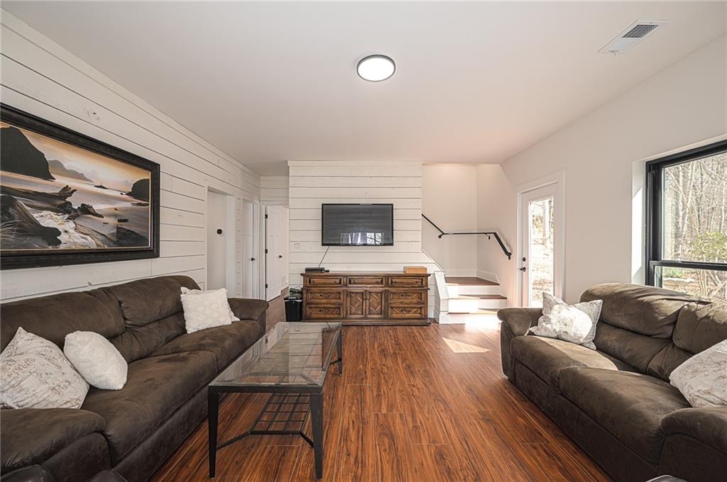 3339 Cove Overlook Road Gainesville, GA 30501 - Photo 31 of 67 a living room with furniture and a couch