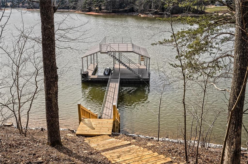 3339 Cove Overlook Road Gainesville, GA 30501 - Photo 40 of 67 a front view of a house with a yard