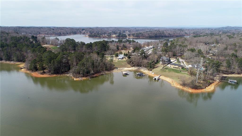 3339 Cove Overlook Road Gainesville, GA 30501 - Photo 63 of 67 an aerial view of residential house with outdoor space and lake view
