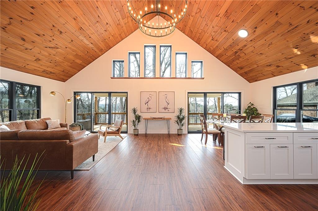 3339 Cove Overlook Road Gainesville, GA 30501 - Photo 7 of 67 a living room with furniture and a large window