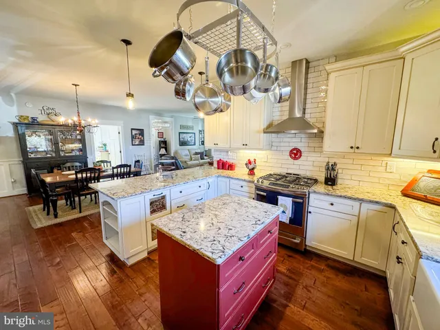 a view of pool with outdoor seating