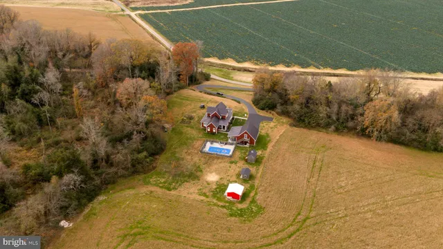 a front view of house with yard nad seating space