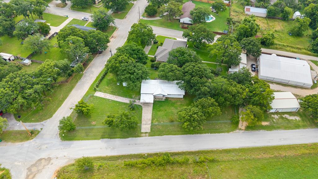 3301 South Murvil Street Decatur, TX 76234 - Photo 4 of 28 Fully fenced and sitting on a corner lot, this home offers plenty of space to roam!
