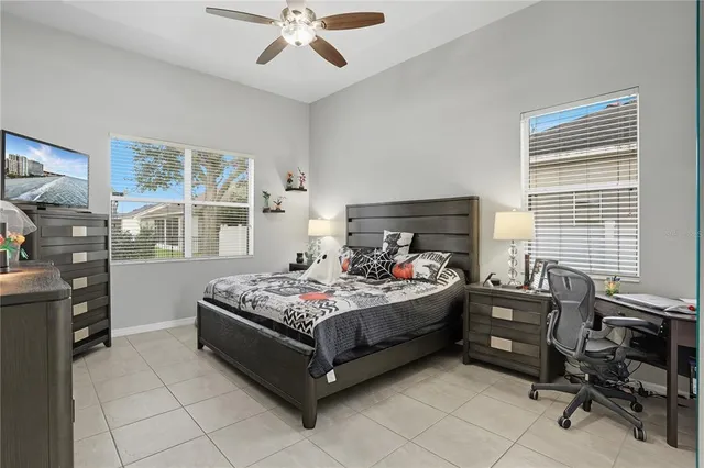 a bed room with furniture and a window