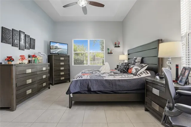a bed room with furniture and a window