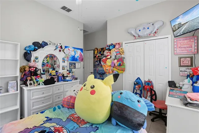 a bed room with a baby bed